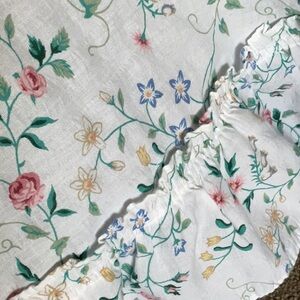 Vintage seersucker bedspread. Floral with ruffles. Pretty.